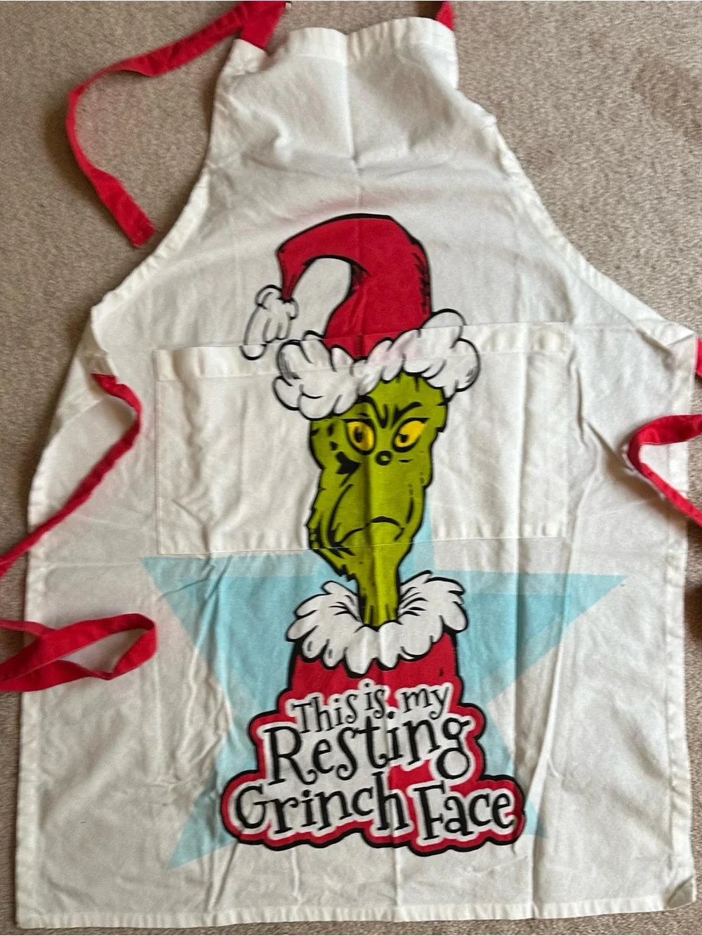 The Grinch Holiday Apron with Red Trim Resting Grinch Face Christmas Apron